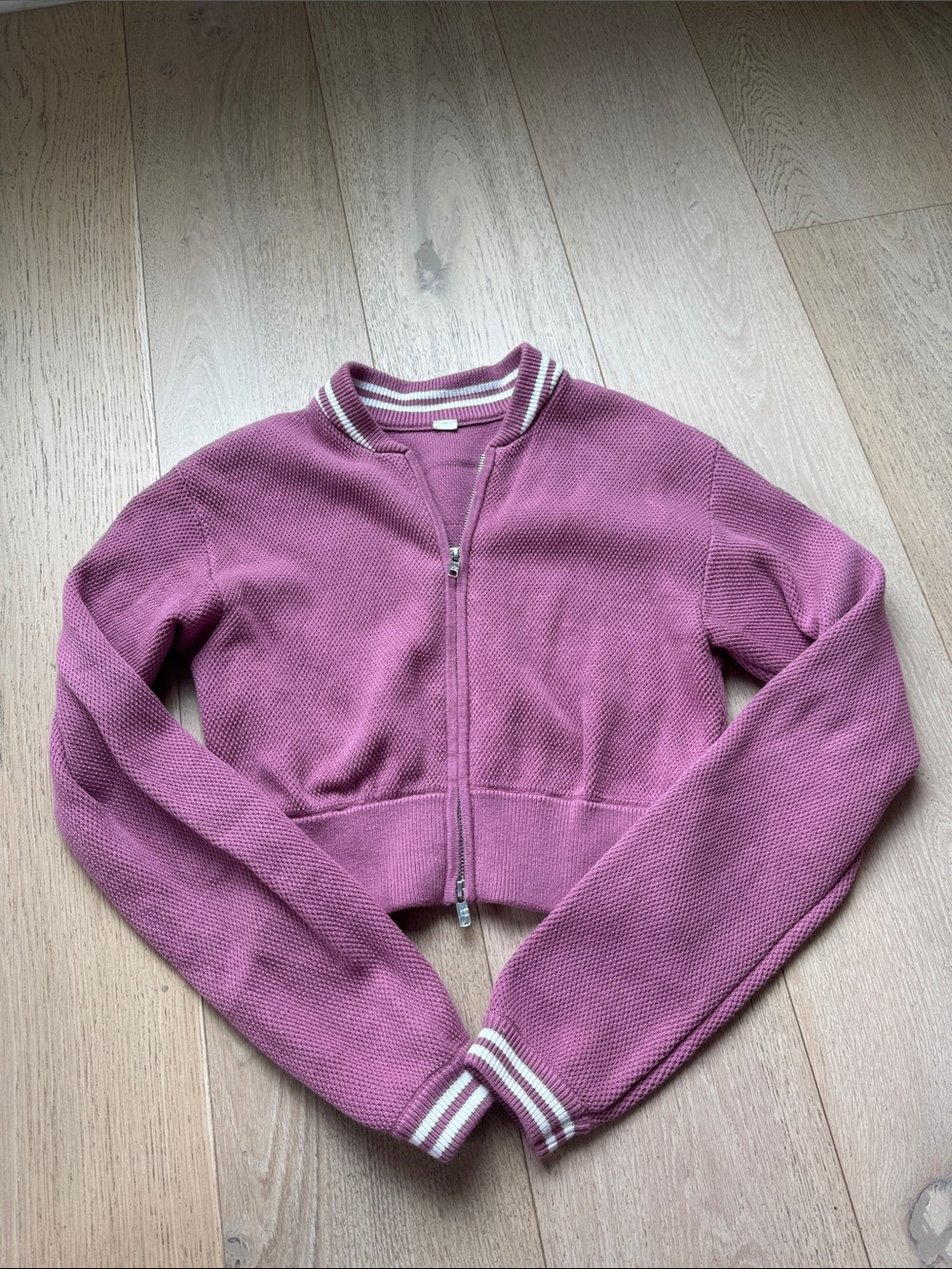 ALO Yoga Cropped Zip-Up Sweater in Mauve Pink